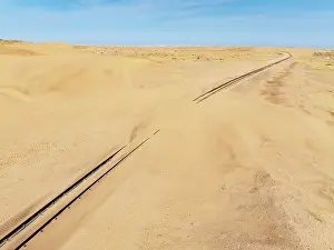 Track: Rails covered with sand in the southern Namib Desert