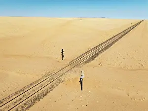 Track: Rails and level crossing in the southern Namib Desert