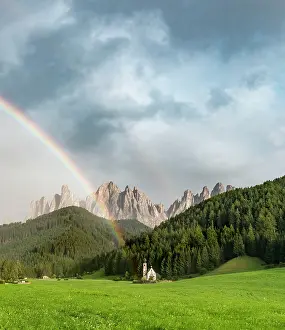 Prismatic: Rainbow in front of the church St. Johann in Ranui