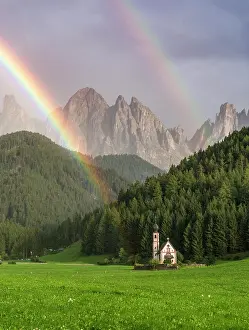 Prismatic: Rainbow in front of the church St. Johann in Ranui