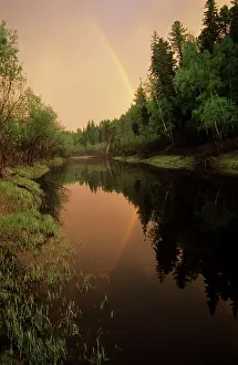 Negustyah: Rainbow after evening rain over river Negustyah
