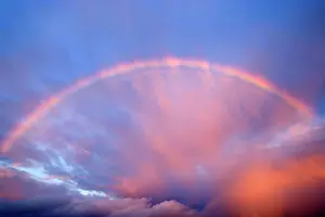 Twelve: Rainbow - formed during a rain storm brewing over