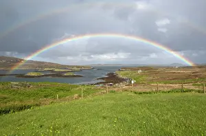 Rainbows: Rainbow over sea loch