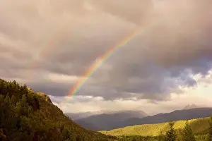 Rainbows: Rainbows and mountains - double rainbow during
