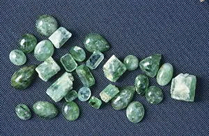 Hexagonal: Raw, cut and polished emeralds