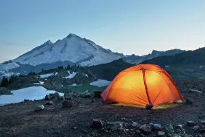 Volcano: Red Big Agnes backpacking tent illuminated at twilight