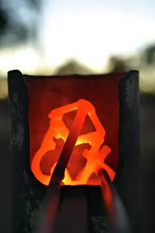 Owners: Red hot branding iron.Brands are burnt into the