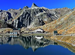 Lodge: Reflection in the Lac du Grand St. Bernard mountain