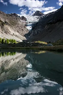 Wallis: Reflection of Ried glacier with alpine landscape in mountain