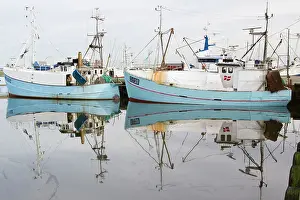 Vessels: Reflections - of fishing vessels in harbour waters