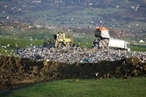 Tractors: Refuse truck at landfill