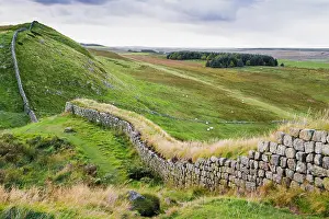 Boundary: Remains of Roman fortifications on moorland, looking