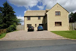 Floods: Residential houses with large areas of paved frontage