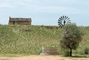 Restored: Restored waterhole / watcher's farm house, built