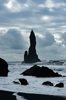 Basalt: Reynisdrangar, Vik, Iceland. Black sand beach in the