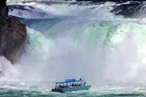 Cruise: Rhine Falls near Schaffhausen, waterfall with excursion boat