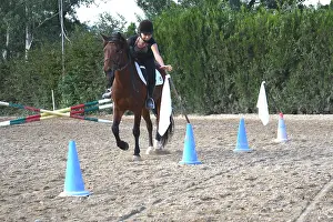 Practicing: Rider practicing pennants game Rider exercise
