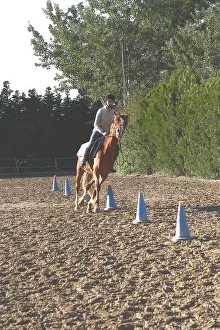 Practicing: Rider practicing slalom Rider exercise