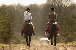 Ride: Riders on a sandy way at spring Netherland