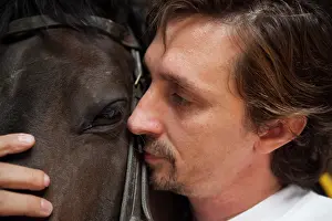Race: Riding instructor cuddling a horse - Argentina
