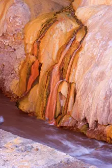 Mendoza: Rio Mendoza - Puente del Inca - bright orange and