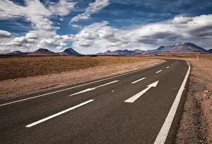 Volcanoes: Road through the Atacama desert, behind volcanoes