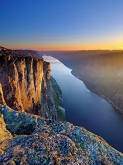 Lysefjord: Rock face of Kjerag above the Lysefjord in the evening