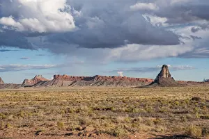 Gloomy: Rock formation and steppe under storm clouds