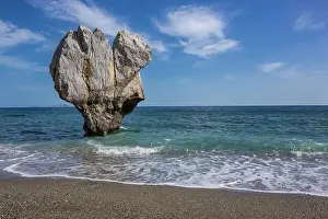 Crete: Rock in heart shape in the sea, Preveli Beach, Agios