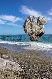 Crete: Rock in heart shape in the sea, Preveli Beach, Agios