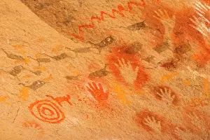 Inhabitants: Rock Paintings - a hunting scene and hands created