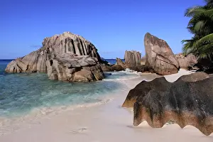 Anse: Rocks on beach at Anse Patates