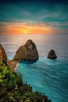 Rising: Two rocks rising out of the sea, coastal landscape