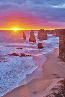 Twelve: Rocky coast with the Twelve Apostles at sunset