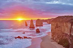Twelve: Rocky coast with the Twelve Apostles at sunset