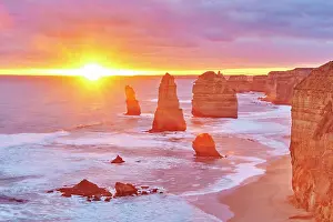 Twelve: Rocky coast with the Twelve Apostles at sunset