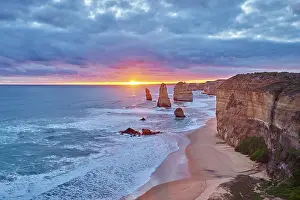Twelve: Rocky coast with the Twelve Apostles at sunset