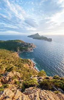 Balearic: Rocky coast with an island, Sunset over the ocean