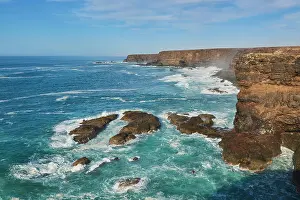 310820: Rocky coast with strong surf, cliffs on the beach