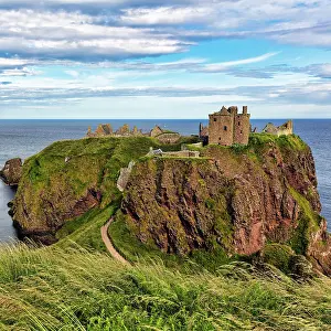 Headland: Rocky headland with castle ruins, Dunnottar Castle