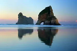 Wharariki: Rocky Islands - by powerful surf sculpted rock