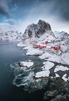 Cabins: Rorbuer fishermens cabins on the snowy fjord, village