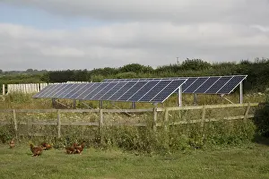 Corner: Row of solar PV photovolataic panels mounted in