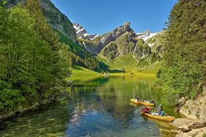 Rowing: Rowing boats on the Seealpsee, behind the Scntis