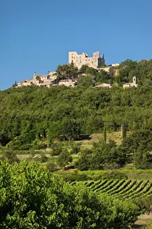 Hilltop: Ruins of Chateau Marquis de Sade above medieval