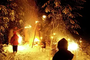 Fires: A Russian family celebrates New Year by a bonfire