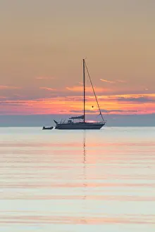 Sailing: Sailboat on the Baltic Sea in sunrise - Germany
