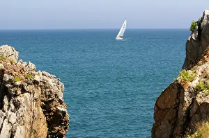 Frazier: Sailboat entering the harbor at Castro Urdiales