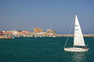 Frazier: Sailboat in the harbor at Castro Urdiales
