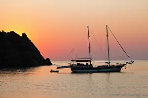 Sailing: Sailboat on the sea at sunrise, Cirali, Lycian coast